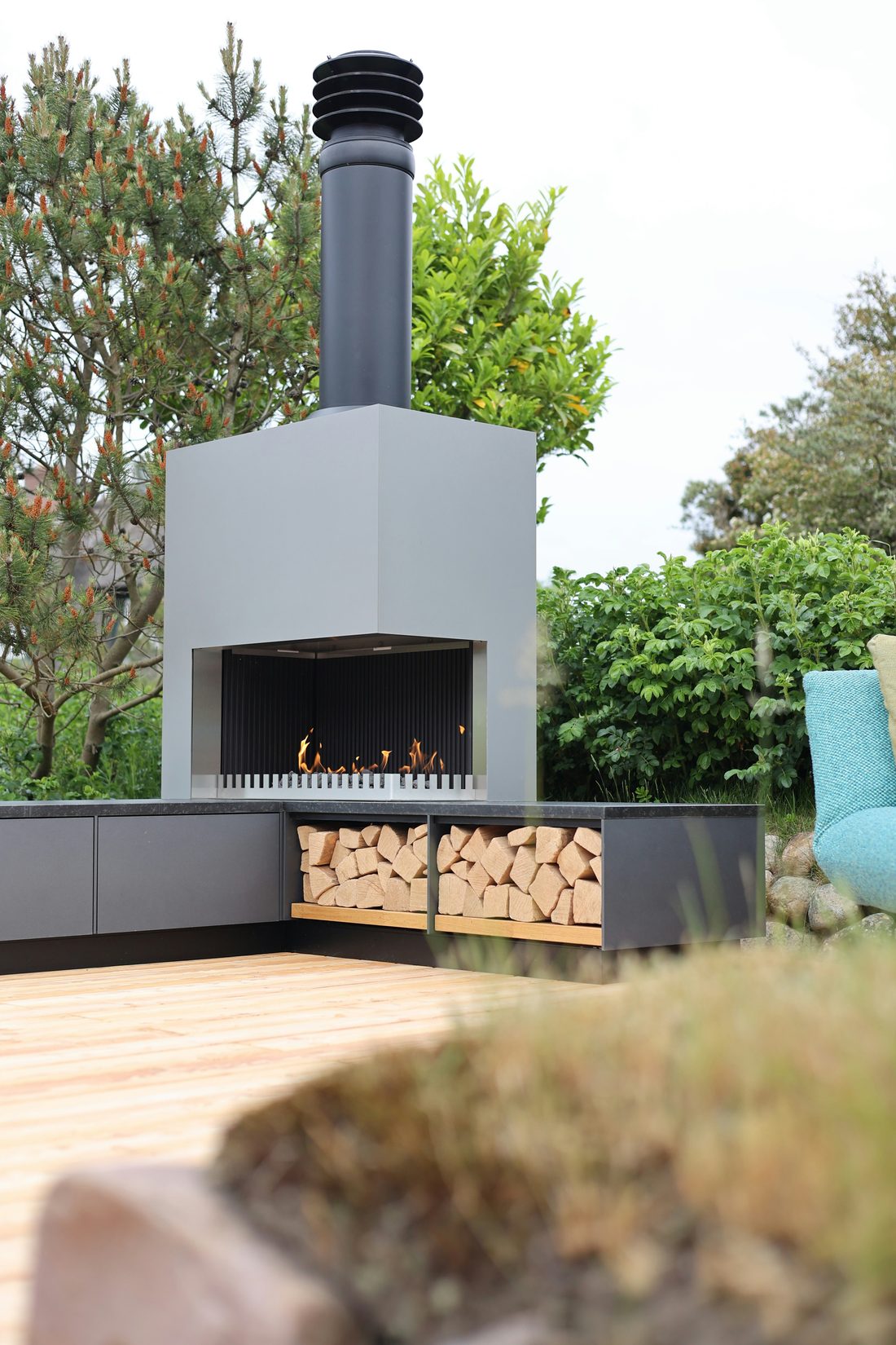 Outdoor fireplace on a covered deck